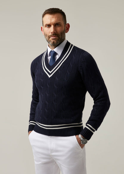 dark navy cable knit cricket jumper with vee neck.