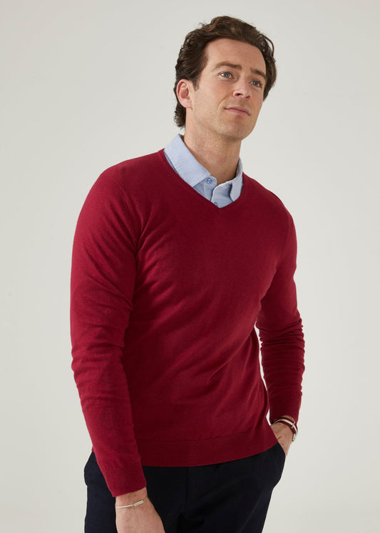 cotton cashmere jumper with a vee neck in claret red.